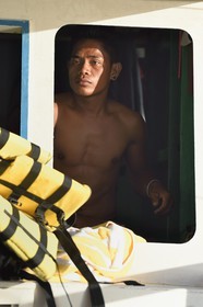 Philippines, Calamian Islands dans le nord de Palawan, baie de Coron, capitaine de pirogue à balancier