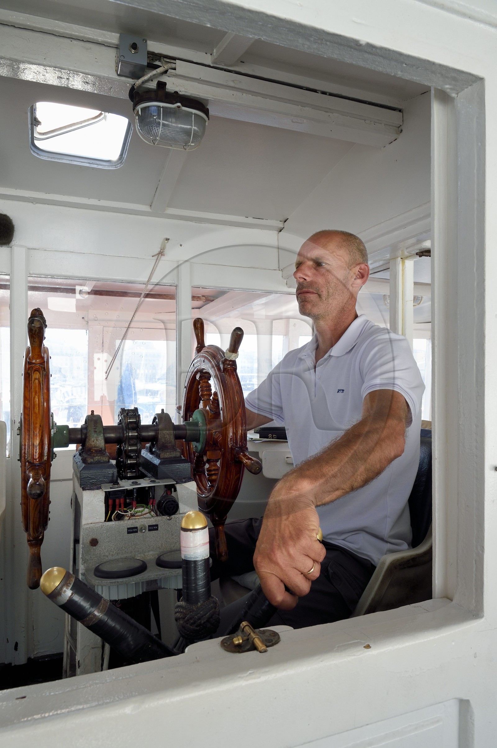 France, Bouches-du-Rhône (13), Marseille, Le Vieux Port, Christian Infossi pilote du Ferry Boat qui traverse le port