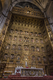 Espagne, Andalousie, Séville, la cathédrale, classé Patrimoine Mondial de l'UNESCO, le retable dans la grande chapelle avec 45 scènes de vie du Christ gravées dans du bois recouvert d'or créé par l'artisan Pierre Dancart (1480), Altar Mayor est le plus grand retable du monde
